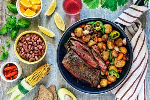 Dinner table, beef, vegetable, mix, grilled, steak, wine, barbecue, stone, ba 写真素材