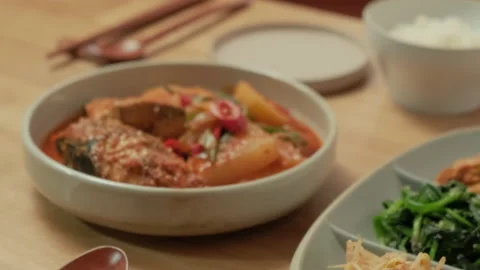 Dinner table with finished Korean fish dishes. Stock Footage 132376867