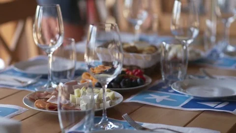 Dinner table with food Stockbeeldmateriaal 82930540