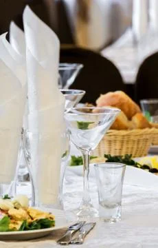 Dinner table with glasses Stock Photos