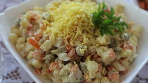 Dinner table, salad in mayonnaise, ready-made salad, Ukrainian cuisine Stock Footage 219329548