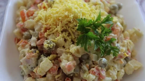 Dinner table, salad in mayonnaise, ready-made salad, Ukrainian cuisine Stock Footage 219329552