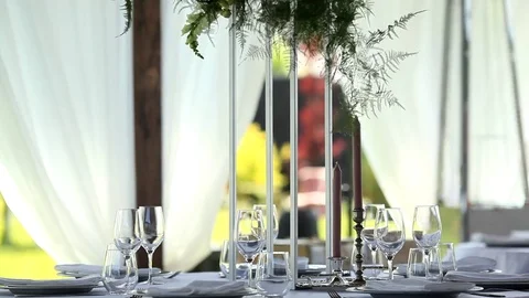 Dinner table served in the open air Stock Footage 79200012
