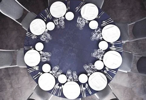 Dinner table set for a party dinner from above Stock Photos