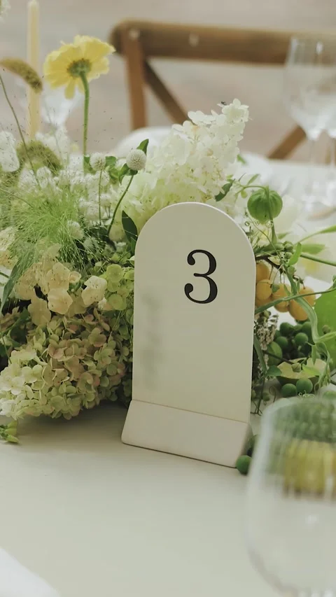 Dinner table setup flower. Wedding Table Decor Featuring an Exquisite Floral Stock Footage 308398367