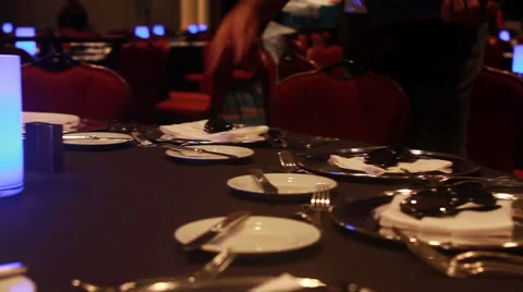 Dinner Table Silverware Setup for Elegant Ballroom Dinner - Red Tablecloth Stock Footage 58337350