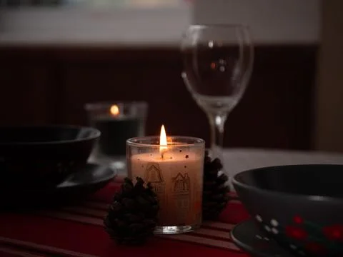 Dinner table for two set with crockery Stock Photos