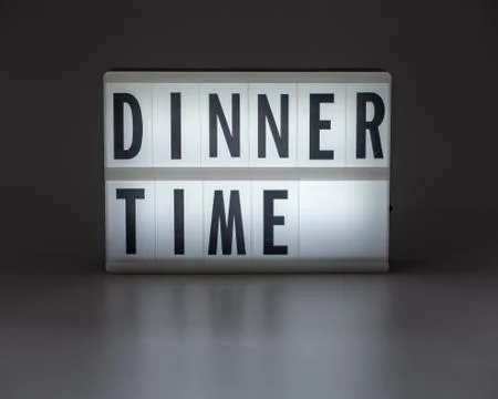 'DINNER TIME' in retro lightbox Stock Photos