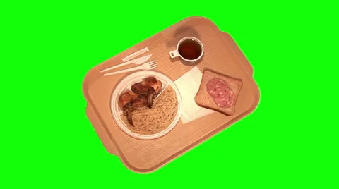 Dinner on tray –chicken wings with rice, bread, sausage, tea, top shot Stock Footage 47577822