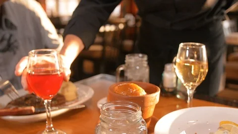 Dinning fire fast server serves entrees Video stock 105320257