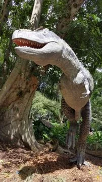 Dinosaur in the forest Stock Photos