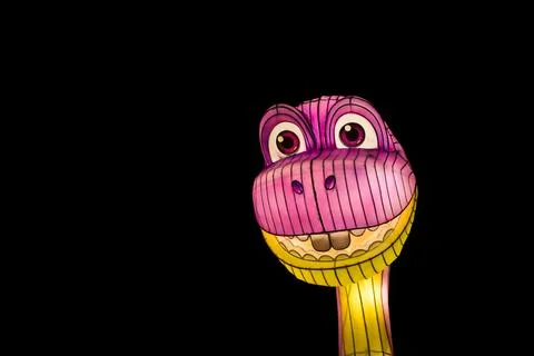 Dinosaur lantern at night Stock Photos