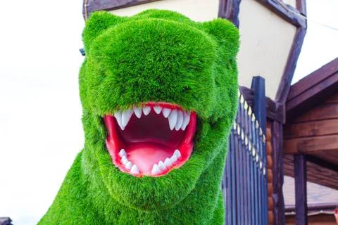 Dinosaur made of artificial grass Foto stock