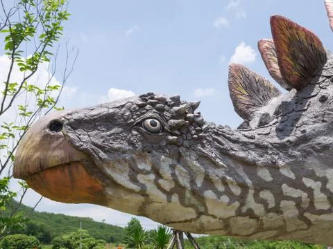 Dinosaur statue in theme park Stock Photos