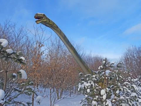 Dinosaur in the winter forest. Stock Photos