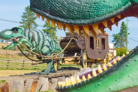 Dinosaurs at Log Barn 1912  Throwback Roadside Attraction Stock Photos