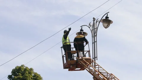 Diode lights, Technician aerial, worker repair Video stock 234426865