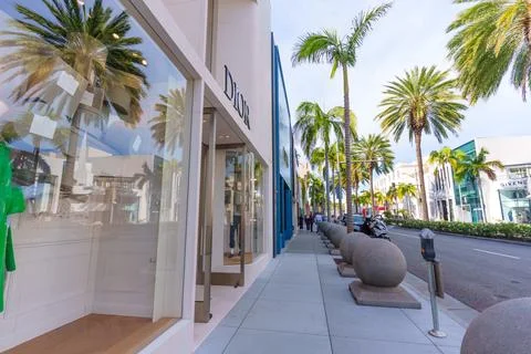 Dior Storefront and Palm Trees on Iconic Rodeo Drive Stock Photos