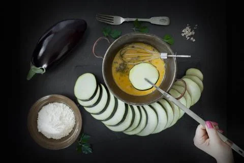 Dip Eggplant Slice In Egg Stock Photos