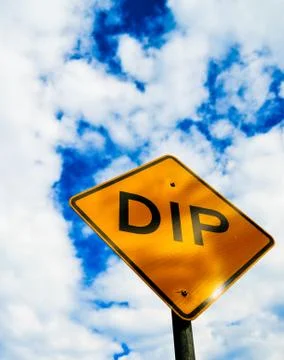 Dip sign with cloudy sky2 Stock Photos