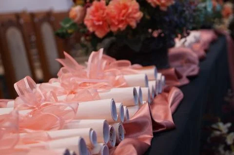 Diplomas on table Stock Photos