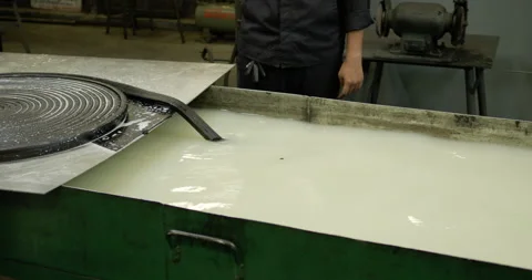 Dipping a boat rim rubber into a solutio... | Stock Video | Pond5