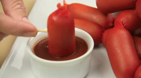 Dipping Cheerios Into Ketchup 스톡 동영상 39443779