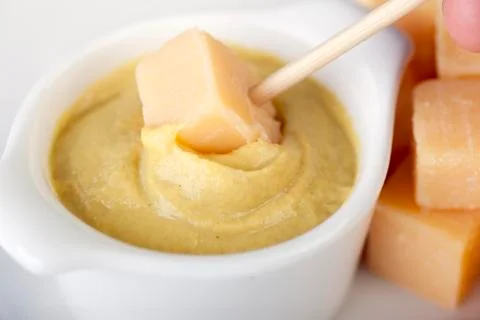 Dipping cheese Stock Photos