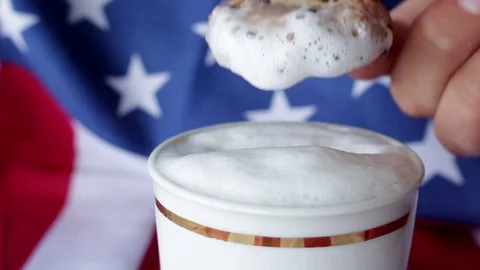 Dipping chocolate chips cookie in milk Stock Footage 76718751