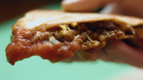 Dipping Crispy Quesadilla into Red Salsa — Tight Close Up Stock Photos
