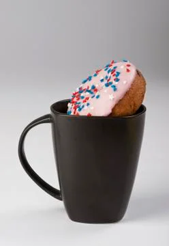 Dipping Donuts. Stock Photos