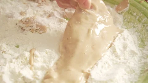 Dipping Fish Fillets in Flour. Stock Footage 258571166