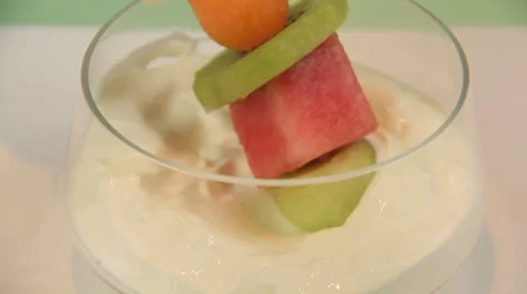 Dipping Fruit Kebabs In Yogurt Stock-Footage 62016536