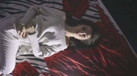 Dipping, the girl on the bed 스톡 동영상 58583363