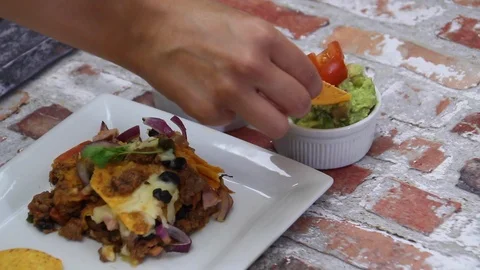 Dipping Guacamole Stock Footage 122741719
