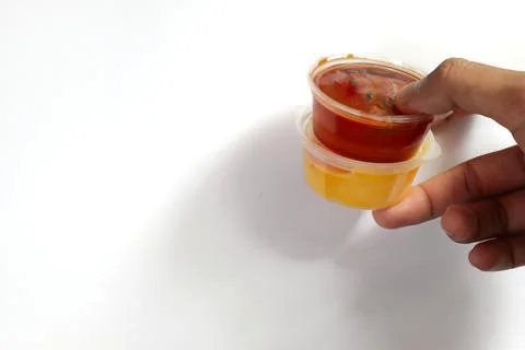 Dipping Sauces Stacked with Culinary Precision on a Pristine White Background Stock Photos