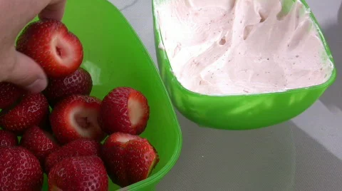 Dipping Strawberries in dip Stock Footage 473913