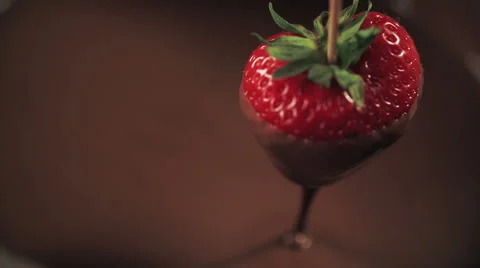 Dipping Strawberries into Melted Chocolate Stock Footage 51597134
