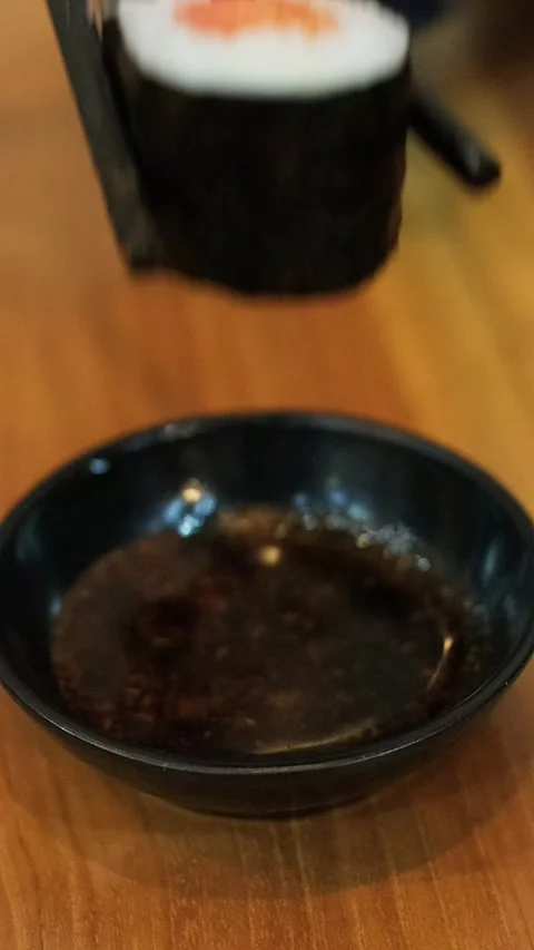 Dipping Sushi 2 (Potrait) Stock Footage 340338799