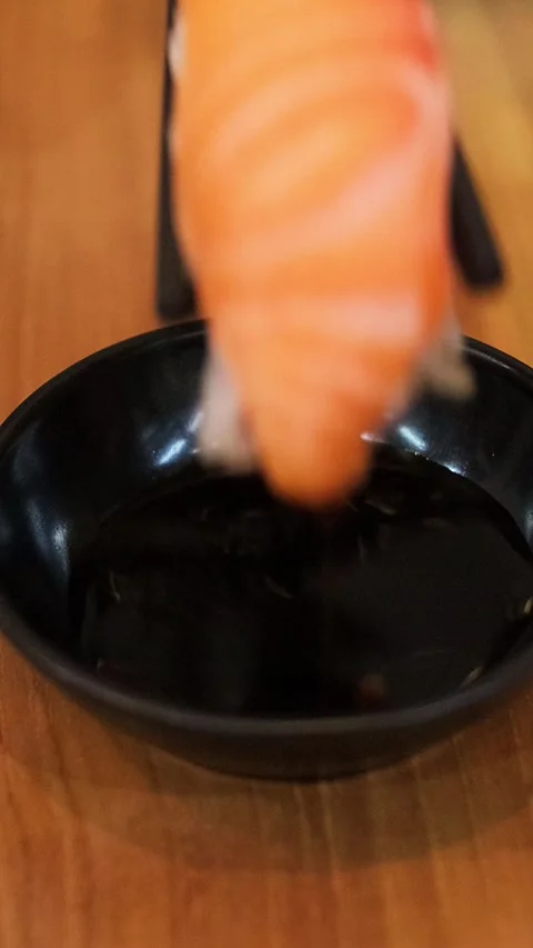 Dipping Sushi (Potrait) Stock Footage 340338806