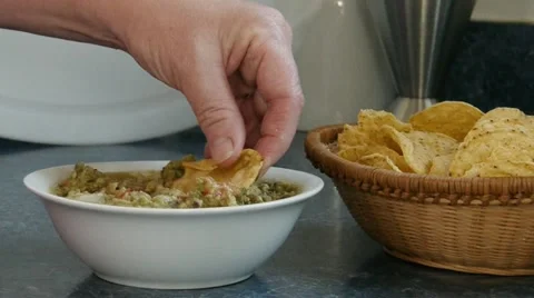 Dipping tortilla chips 動画素材 10877904