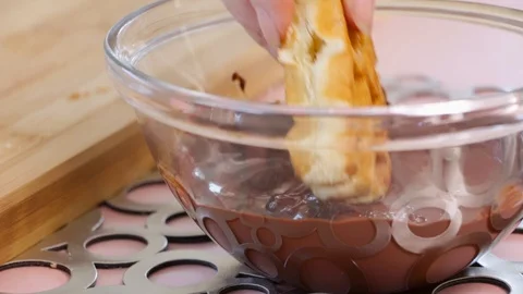 Dipping A Waffle in Melted Chocolate Stock Footage 87769670