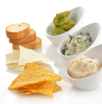 Dips with chips and toasts Stock Photos