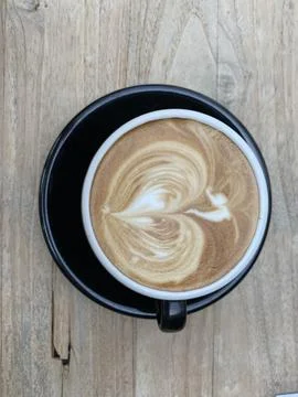 Direct above coffee latte on the table Stock Photos