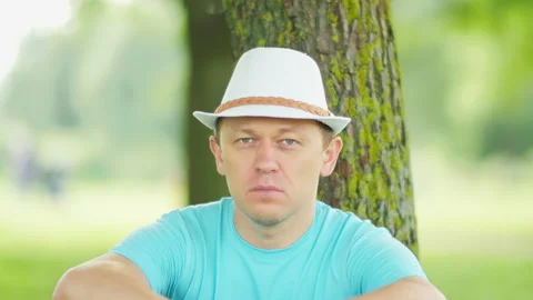 A direct and confident look at the camera of a young man Stock Footage 148177975