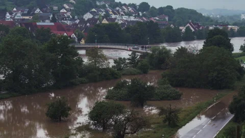 Direct comparison of flooded river in Germany - cut in the middle Stock Footage 285440383