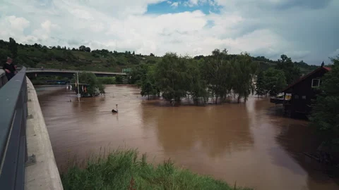 Direct comparison of flooded river in Germany - cut in the middle Stock Footage 285442002