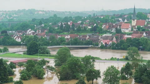 Direct comparison of flooded river in Germany - fade in the middle Stock Footage 285444015