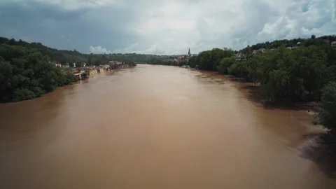Direct comparison of flooded river in Germany - fade in the middle Stock Footage 285444964
