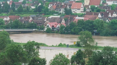 Direct comparison of flooded river in Germany - fade in the middle Stock Footage 285445196